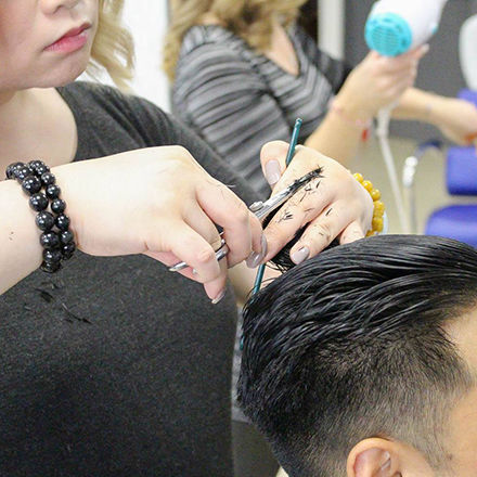 Man getting a haircut at a Vancouver hair salon